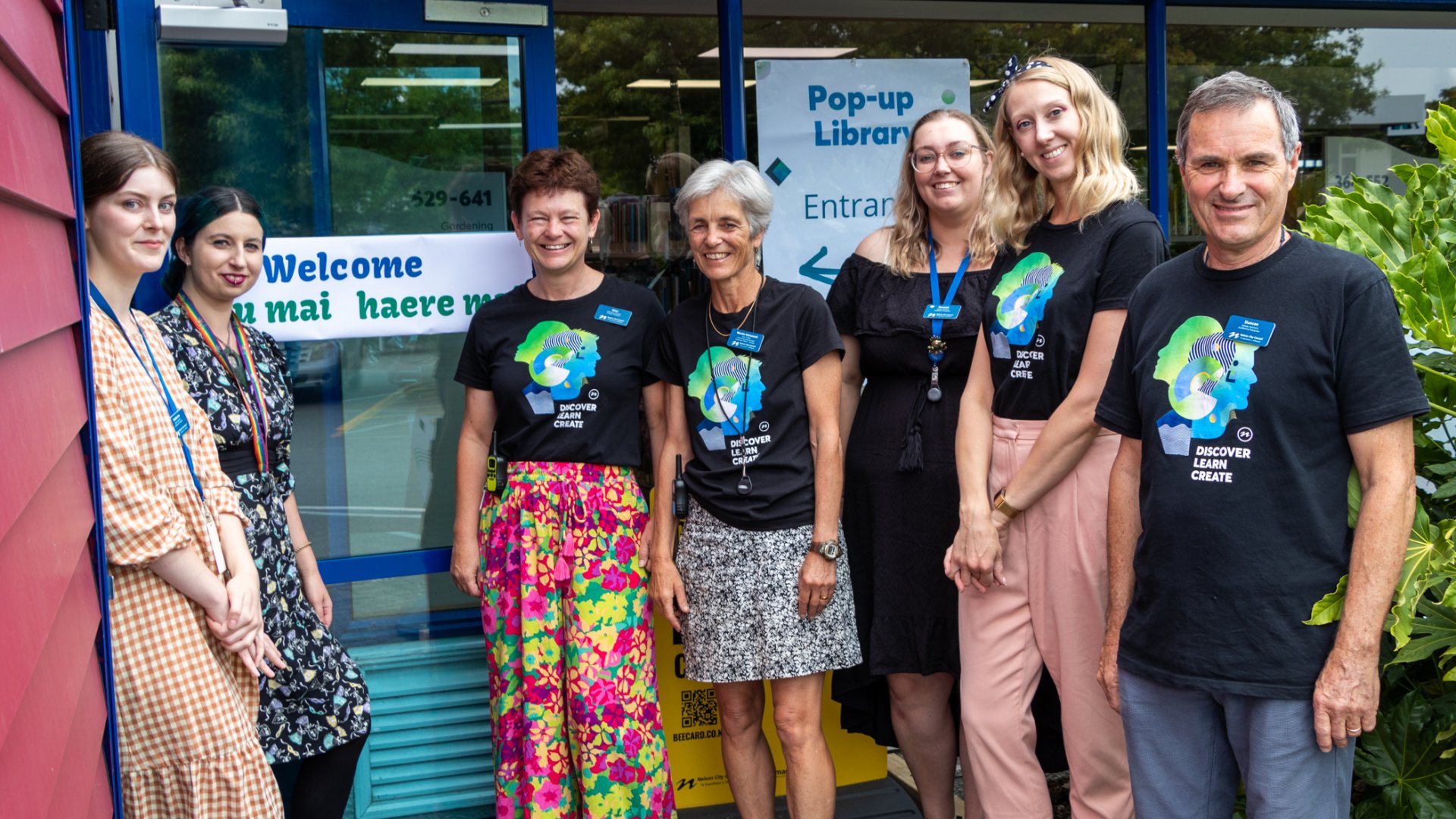 Library staff welcome the public to the Elma Turner Pop-up Library extension through the new entrance off the Library carpark on 25 January 2023.