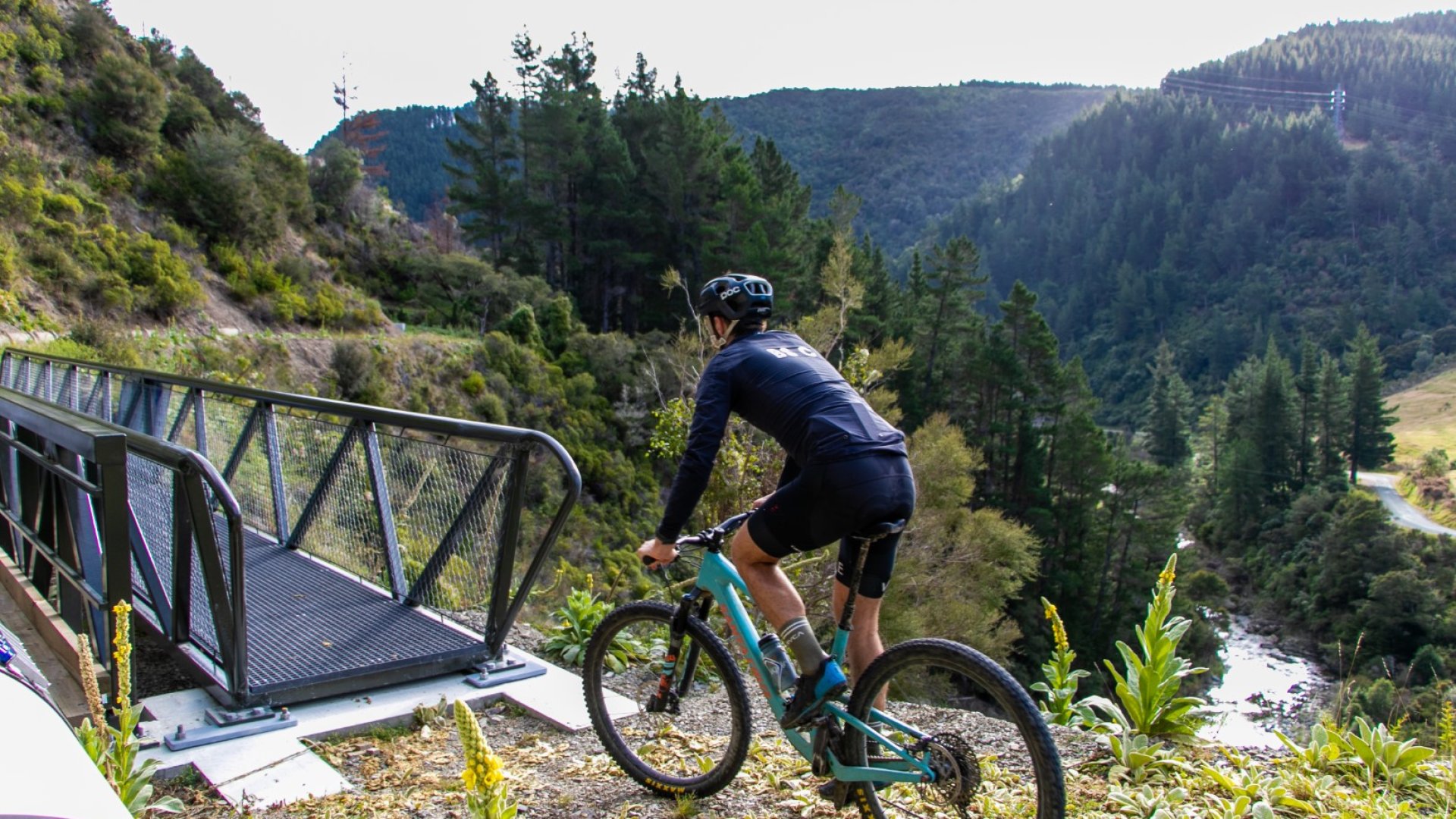 A mountain biker rides across the new bridge installed next to the recently repaired Maitai Raw Water Pipeline. Note: this photo was taken before the on ramp to the bridge was installed. 