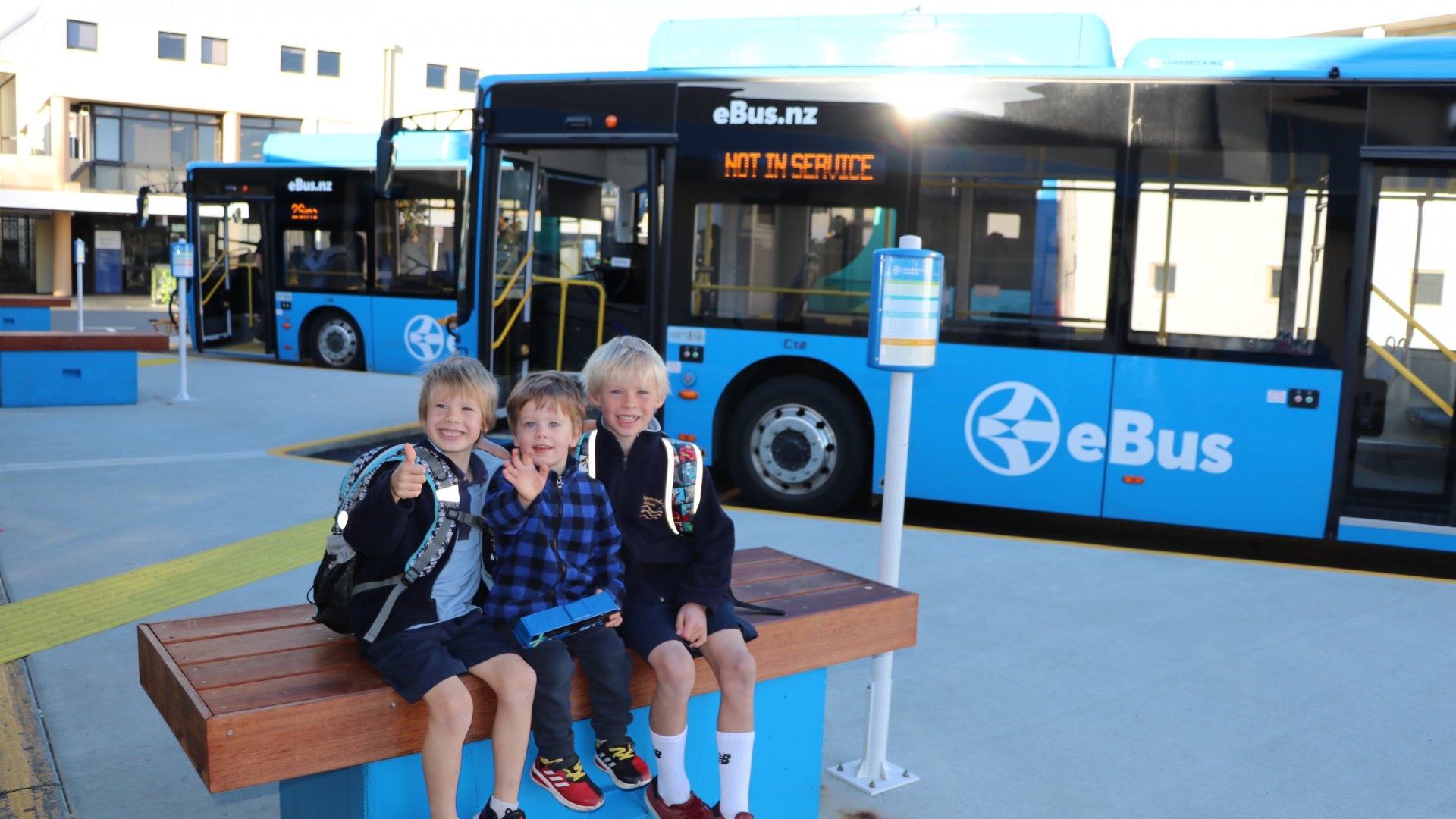 Xander, Hadley and Jayden on their way to school on the eBus