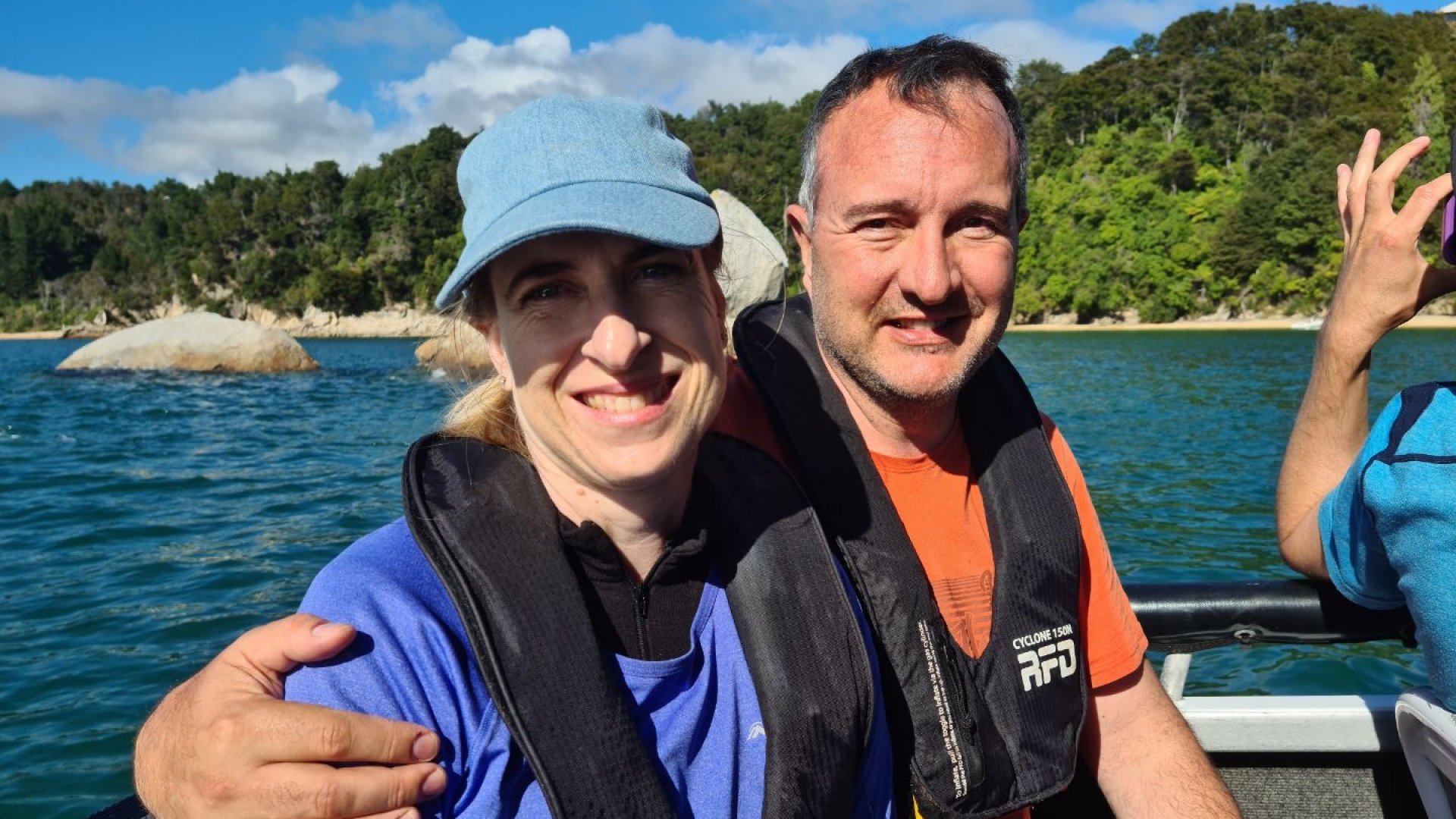 John and Anika out boating.