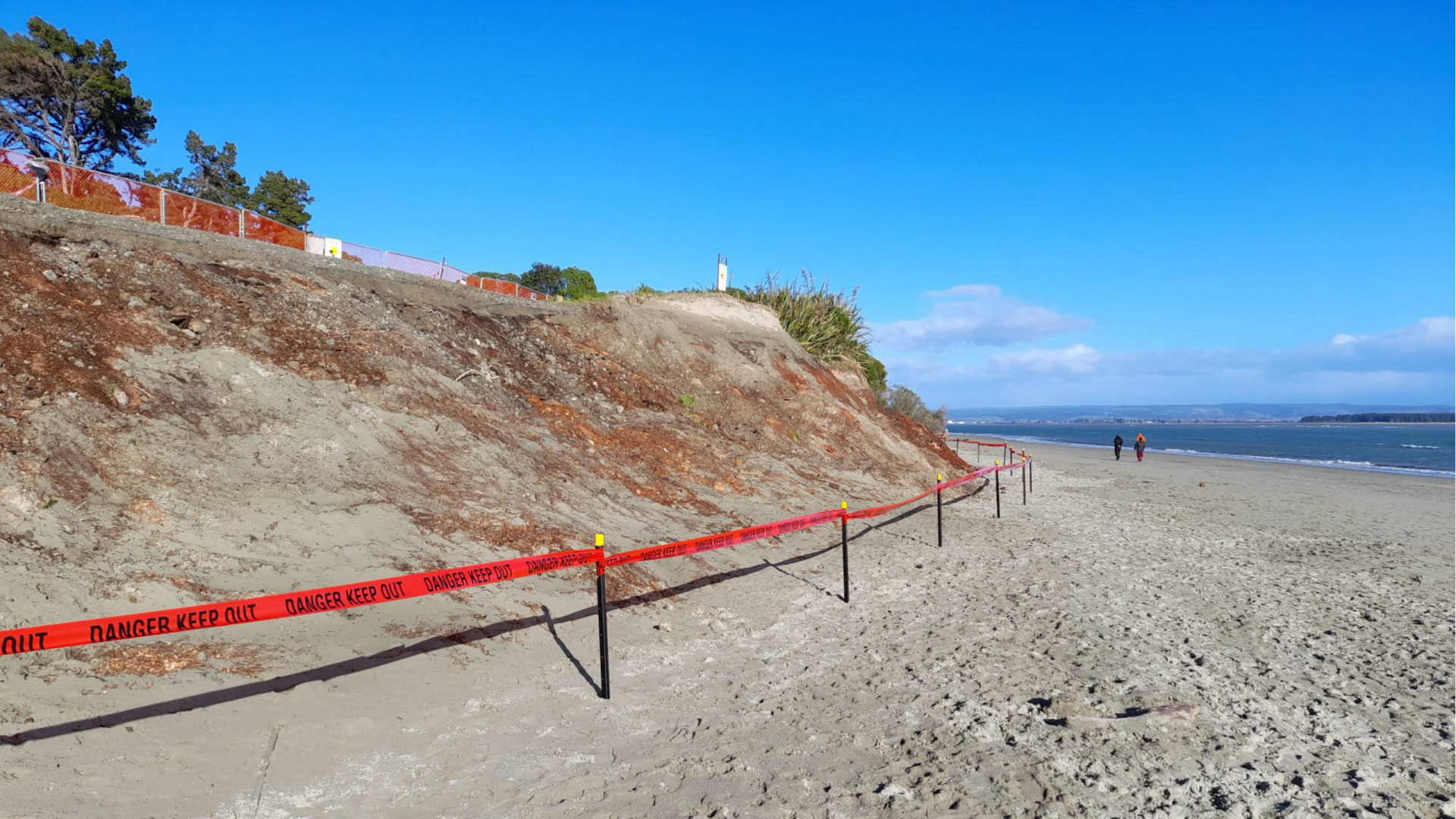 Exposed sawdust material at the front face of the raised carpark at Tāhunanui Back Beach, which is currently taped off because of the risk of collapse due to erosion.  