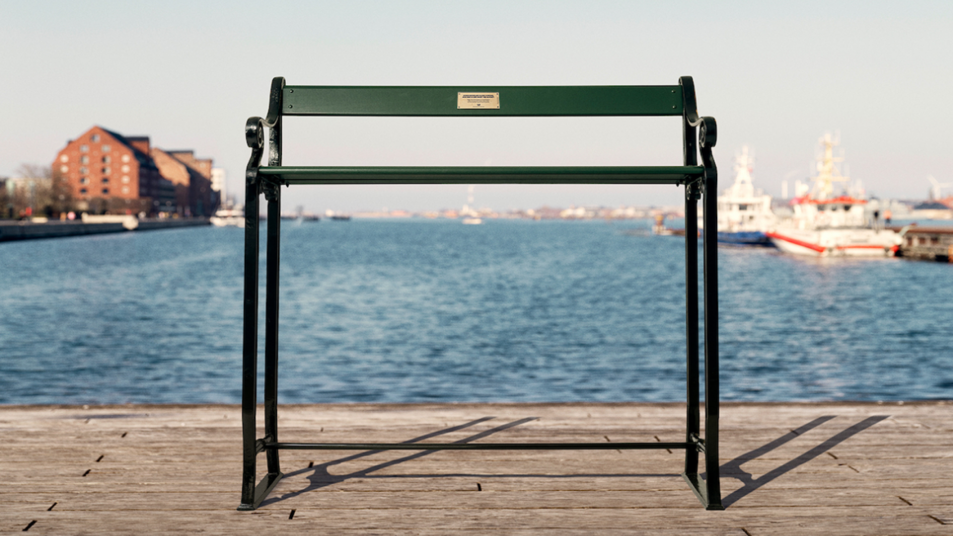 Park benches in Copenhagen have been raised to show future sea-level rise. Image: Maria Schumann & Kristian Vestergaard