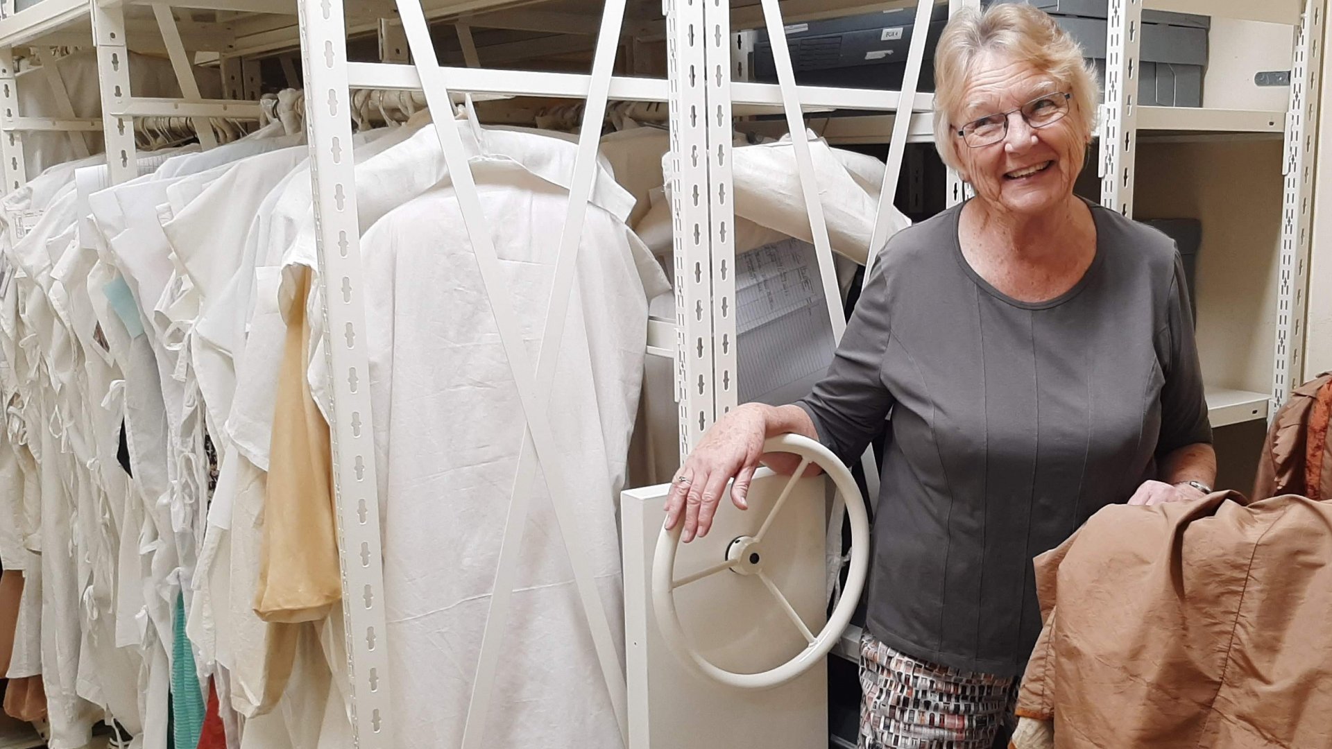 Mary Gavin in the Costume and Textile Collection at Broadgreen Historic House.