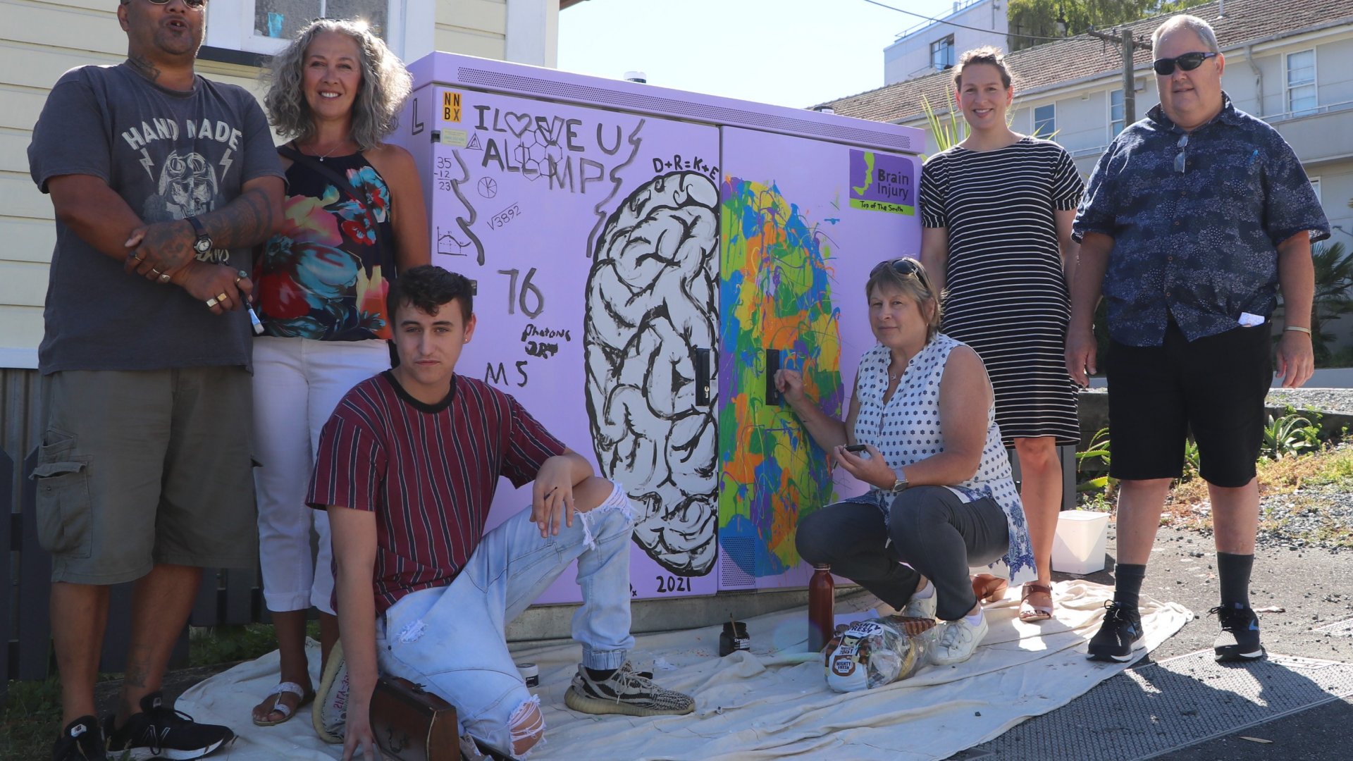 Members and staff from the Brain Injury Association at work on their cabinet in Franklyn St. Emile Grey, left, Association Board Member Maria Williams, Matthew Sharp, Maxine McKean, Association Liaison Officer Rachel Gordon and Martin Hughes.<br />
