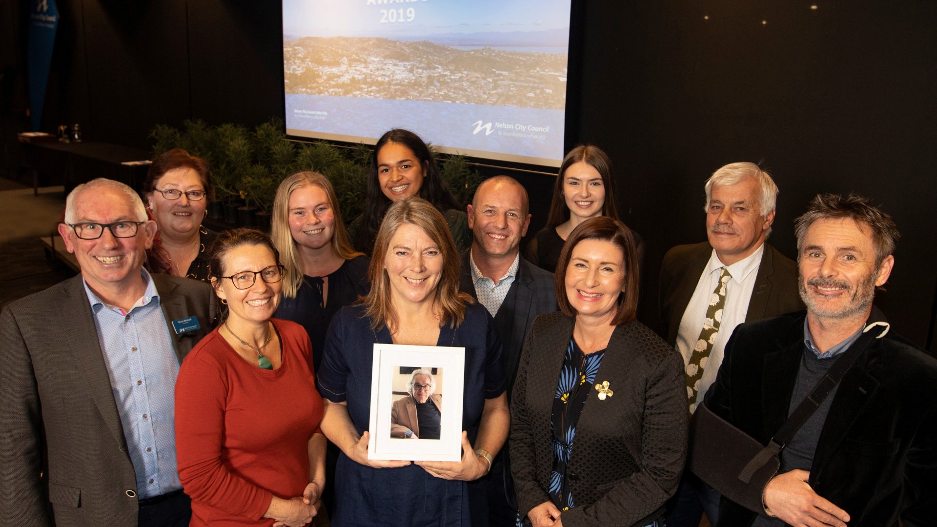 Caption: (L to R) Councillor Brian McGurk, Margaret Goff, Councillor Kate Fulton, Zoe Palmer, Josephine Ripley (Nelson College for Girls) Ron Kelly, Eleanor Upton with photo and Miles Fitton (accepted award on behalf of James Upton), Emma Edwards (Nelson College for Girls), Mayor Rachel Reese, Ron Kelly and Councillor Matt Lawrey at the Eelco Boswijk Awards at the Trafalgar Centre on Tuesday night.